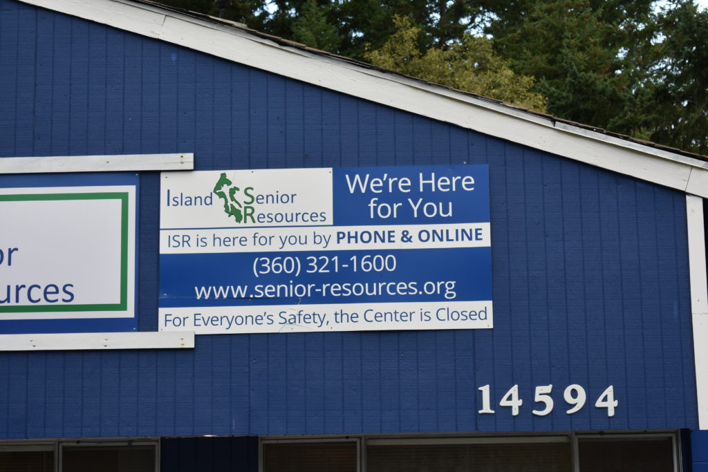 image of the sign on the bayview center that says we're here for you by phone and online